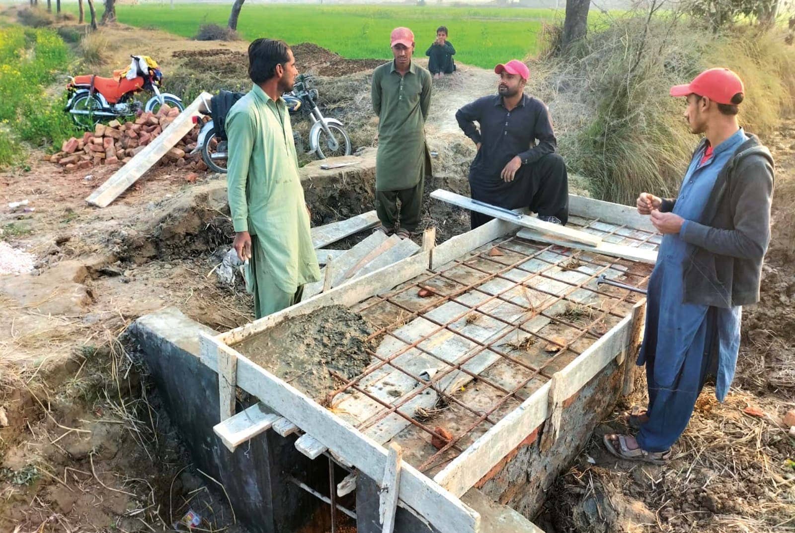 Trust field team at work in a village